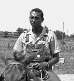 Stokely Carmichael going house to house on his mule Stokely Carmichael going house to house on his mule